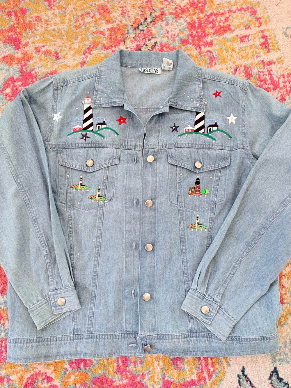 Vintage Las Olas embroidered denim jacket featuring a coastal lighthouse theme